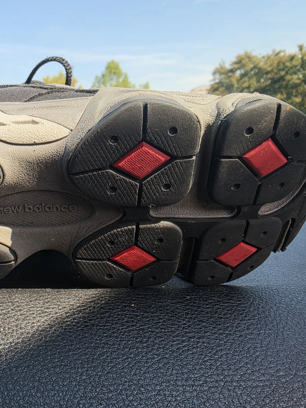New Balance Black and Gray Kids Sneakers with Red Accent